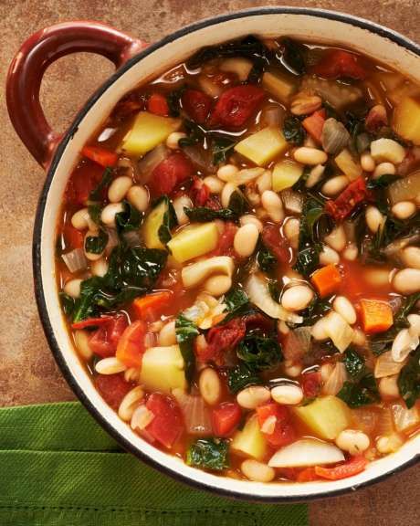 Portuguese White Bean and Kale Soup from Moosewood Restaurant Favorites: The 250 Most-Requested, Naturally Delicious Recipes from One of America s Best-Loved Restaurants by The Moosewood Collective (St. Martin s Griffin). Photo: St. Martin's Griffin / © Jim Scherer, 2012 / jim@jimscherer.com Kale White Bean Soup, Kale White Bean, Dried Peas, Peas Recipes, White Bean Kale Soup, Fennel Bulb, Beans Potatoes, Kale Soup Recipes, Potatoes Carrots