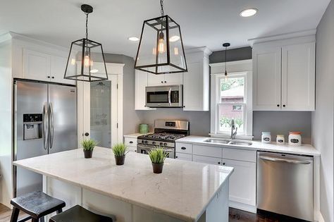 White and gray kitchen features a corner frosted glass pantry door placed next to an under cabinet ... Kitchen Corner Pantry, Corner Kitchen Pantry, Best Kitchen Layout, Pantry Layout, Kitchen Layouts With Island, Glass Pantry Door, Corner Pantry, U Shaped Kitchen, Kitchen Corner