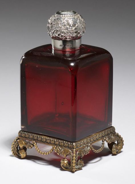 Lot 558 - A VICTORIAN SILVER MOUNTED RUBY GLASS SCENT BOTTLE on beaded brass base. faceted stopper, 13cm h, Fragrance Tester, Perfume Bottle Art, Beautiful Perfume Bottle, Antique Perfume Bottles, Beautiful Perfume, Antique Perfume, Antique Bottles, Vintage Bottles, Potion Bottle