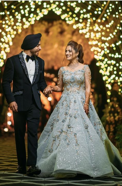 Engagment Dress Indian Couple, Blue Gown For Engagement Indian, Indian Reception Gown Bridal Collection, Indian Engagement Dress For Bride, Ring Ceremony Dress Indian Couple, Couple Poses In Gown, Dress For Ring Ceremony, Unique Engagement Dress For Bride Indian, Indian Wedding Gowns Engagement