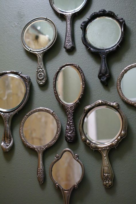 Vintage wall mounted hand held mirror collection. Thrift Board, Smart Tiles, Living Vintage, Antique Mirrors, Big Mirror, Large Wall Space, Vintage Mirrors, Tall Ceilings, Marauders Era