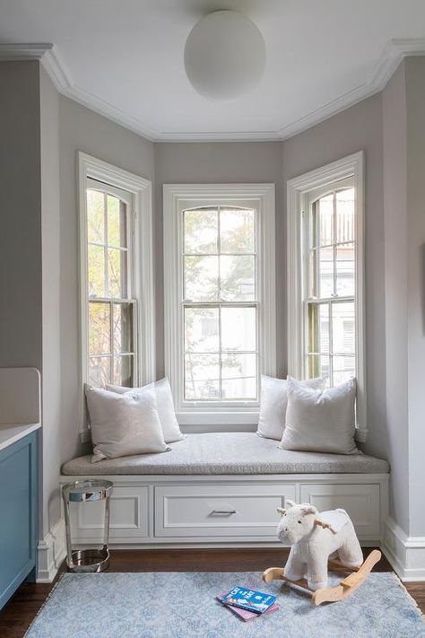 Bay Window Seating Bedroom, Chair In Bay Window, Big Window With Bench, Bay Window Cushion Ideas, Built In Bay Window Seating, Bay Window Seat Aesthetic, Bay Window Dog Bed Built Ins, Grey Window Seat, Bay Window Seat With Storage