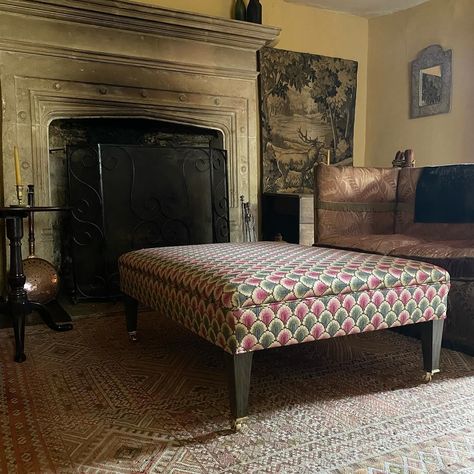 A large Berwick bespoke footstool by Noble. Finished in Walsingham Weave by Flora Soames with the stained tapered legs terminating in brass castors. Our footstools can be made in any size with a choice of leg designs, finished in a fabric of your choosing. #noble #nobletetbury #antiques #antiquedealersofinstagram #interiors #interiordesign #interiordesignersofinstagram #bespoke #bespokefurniture #nobleandthane #tetbury #shoplocal #countryhouse #tetburyinteriordesign #interiorinspo Modern Footstool, Footstool Coffee Table, Library Chair, Wine Table, Bespoke Lighting, Bespoke Furniture, Coffee Table Design, Upholstered Furniture, Interior Inspo