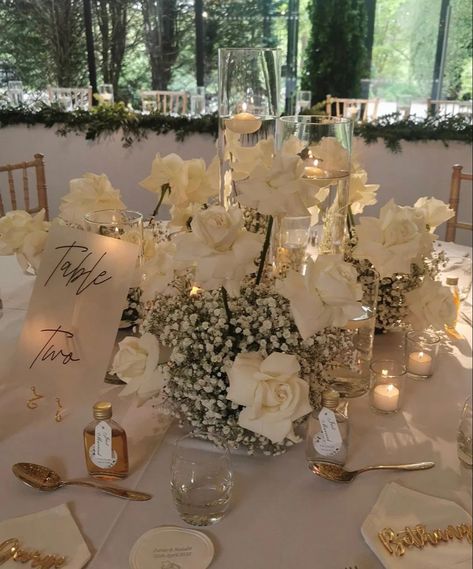 Ivory And Greenery Wedding, Big Floral Centerpieces, White Floral Centerpieces Round Table, Diy White Centerpieces, Romantic Elegant Wedding Decor, Wedding Square Table Decorations, Olive Ivory Wedding, White Flowers Candles Centerpieces, White Flower Candle Centerpieces