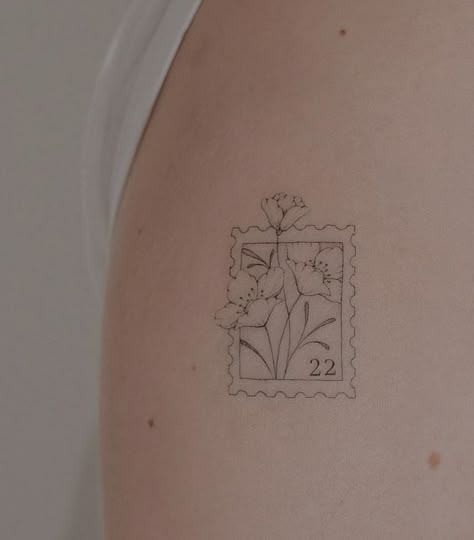 Crested Crane Tattoo, Alabama State Flower Tattoo, Law School Tattoo Ideas, Womens Small Arm Tattoos, California Poppy Stamp Tattoo, Small Picture Frame Tattoo, Western Red Lily Tattoo, Post Stamp Flower Tattoo, Dainty Tattoos Aesthetic