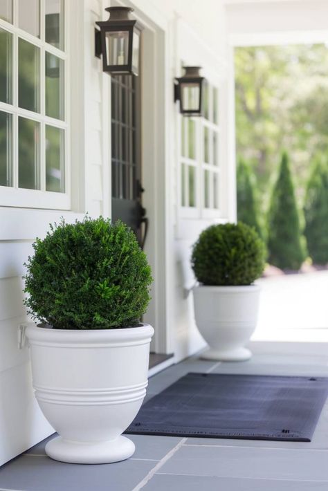 40 Front Porch Planter Ideas To Elevate Your Curb Appeal Front Porch Potted Trees, Modern Front Porch Planter Ideas, Entrance Planters Ideas, Front Porch Urn Planter Ideas, Asymmetrical Front Porch, Front Porch Pots & Planters, Front Porch Potted Plant Ideas, Front Porch Topiary Ideas, Front Porch Topiary