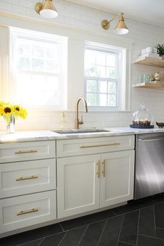 white cabinets, open shelves, gorgeous sconces over windows Coastal Paint, White Subway Tile Backsplash, White Shaker Cabinets, Bronze Cabinet, Classic Kitchen, Gold Kitchen, Kitchen Hardware, Champagne Bronze, Studio Mcgee