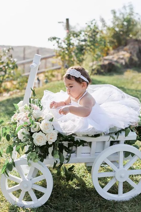 One Year Old Flower Girl, Baby Wagon Wedding, Flower Girl Wagon Ideas Wedding, Baby Flower Girl Wagon, Wedding Wagons For Flower Girl, Flower Girl Wagon Ideas, Baby At Wedding, Wedding With Baby, Flower Girl Wagon