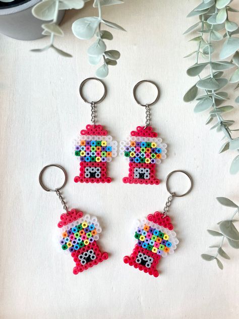 This is a listing for one keychain. If needed more, add the number under quantity. These make excellent party favors or gifts. Need more? Send me a message, we will be happy to make more. (A discount is provided for large orders of 10+) Perler Keychain Pattern, Mcdonalds Perler Beads, Melty Bead Keychain, Unique Perler Bead Ideas, Peeler Bead Magnets, People Perler Bead Patterns, Fuse Bead Keychains, Cute Diys To Sell, Gumball Perler Beads