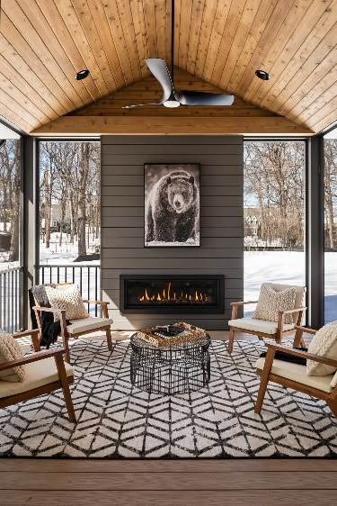 This cozy screen porch has big views! With a vaulted ceiling, large screens and a fireplace, this porch can be used spring, summer, & fall in Minnesota! Screen porches are often one of the most used rooms in a home because of their coziness. Add a TV above the fireplace - perfect for watching a football game in the fall! Sunroom Remodel, Practical Home Decor, All Season Room, Screen Porches, Screened Porch Designs, Three Season Room, Porch Fireplace, Porch Remodel, Porch Addition