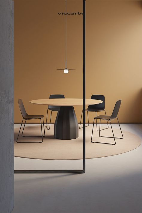 Designed by Patricia Urquiola, Burin table’s silhouette plays tribute to the traditional wood carving tools. With Burin table you can combine different finishes, heights and dimensions for the base and tabletop, adapting to the aesthetic requirements of each space. Black Round Dining Table, Patricia Urquiola, Meeting Table, Workplace Design, Elegant Furniture, Office Decoration, Office Interior Design, Commercial Design, Meeting Room