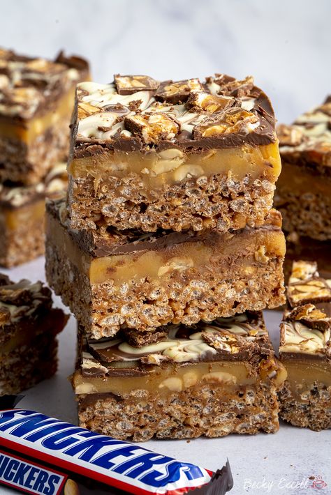 Gluten Free Squares And Bars Recipes, Freezable Squares, Millionaire Bars Rice Krispies, Gluten Free Squares, Cereal Squares, Snickers Rice Krispie Treats, Gluten Free Slice, Gluten Free Traybake, Gluten Free Traybake Recipes