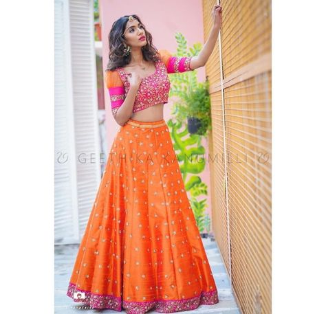 Pinterest • @Niharikabhardwaj Candy Red Color, Geethika Kanumilli, Garba Dresses, Lehenga Color Combinations, Desi Couture, Garba Dress, Orange Lehenga, Hand Embroidery Work, Mehndi Dresses