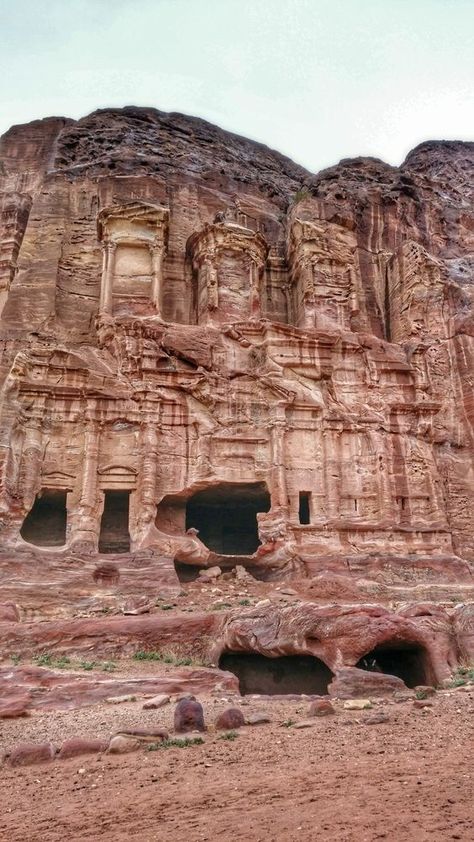 The Corinthian Tomb in Petra, Jordan, stands as an exquisite example of the blend of Nabatean and classical architecture, characterized by its elaborate Corinthian columns and intricate facade, a testament to the advanced artistic and architectural skills of the Nabateans in the ancient world. #CorinthianTomb #PetraJordan #NabateanArchitecture #AncientWorld #ClassicalInfluence #HistoricalMonuments #ArchaeologicalWonder #CulturalHeritage #MiddleEastHistory #ArtisticLegacy Melted Buildings, Corinthian Columns, The Corinthian, Ancient History Archaeology, Ancient Tomb, Ancient Astronaut, Turn To Stone, Unusual Buildings, Petra Jordan