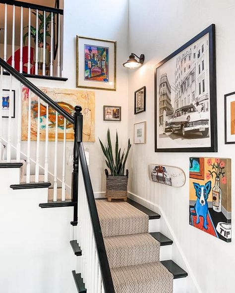 Stairwell Wall Covered with Different Size Canvas Townhome Stairway Decorating, High Staircase Wall Decor, Creative Stairway Ideas, Art For Staircase Wall, Stairwell Corner Decor, Basement Stairway Decorating Ideas, Living Rooms With Stairs, Fun Stairwell Ideas, Staircase Big Wall Art