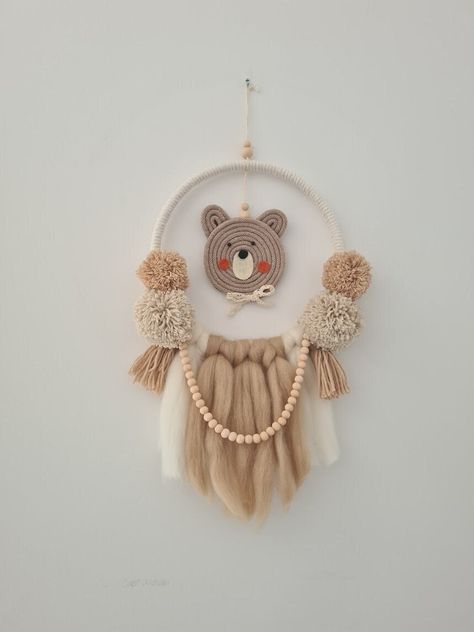 Neutral nursery wall hanging decor with teddy bear in brown, beige and ivory colours, macrame cute teddy's head  and with fluffly pompoms, felt, tassels and beads chain.  Perfect dream catcher or door sign for girl, boy nursery or toddlers bedroom. It fit with our Teddy bear ceiling lamp available on the listinig below: https://www.etsy.com/uk/listing/1472958947/neutral-colours-nursery-lampshade This unique neutral wall hanging decor will add beautiful and modern touch and fit to little kids, ne Bedroom Handmade Decoration, Macrame Baby Room Decor, Macrame For Kids Room, Macrame For Kids, Macrame Kids Room, Baby Door Decorations, Nursery Lampshade, Macrame Bear Wall Hanging, Macrame Animal Wall Hanging