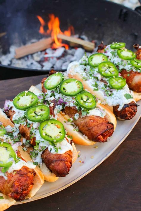 Bacon Wrapped Chorizo Dogs - Over The Fire Cooking Chorizo Hot Dog, Cilantro Lime Cream Sauce, Cilantro Lime Cream, Lime Cream Sauce, Bacon Wrapped Recipes, Dogs Recipes, Homemade Chorizo, Over The Fire Cooking, Hot Dogs Recipes