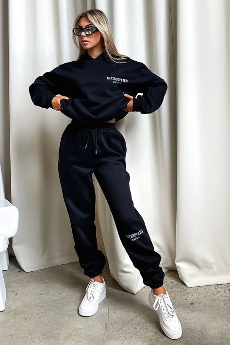 Living boujee and lounging in style! The Series 6 Sweatpants offer a soft fleeced inside, elasticated waistband with tie up drawstrings, a 'THATSSOFETCH' logo at the knee and cuffed ankles. Pair with the matching hoodie, sneakers and sunnies for a casual Sunday vibe. FABRICATION: 65% Cotton 35% Polyester SIZING: Olivia's height is 163cm / 5'3 and wears a size AU6/US2. Hoodies For Ladies, Sweatpants Outfit Photoshoot, Cute Sweat Suit Outfits, Sweatpants Photoshoot Ideas, Nike Wardrobe, Church Photoshoot, Boutique Photoshoot, Long Cape Coat, Black Runners