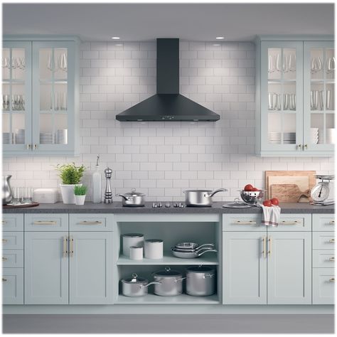 Work in a smoke-free, odorless kitchen with this 36-inch GE pyramid chimney hood. Its four-speed fan and convertible venting options provide flexible operation, and its dual halogen cooktop lighting illuminates your work area. This wall-mount GE pyramid chimney hood has easy-to-reach electronic backlit controls, and its auto-off feature can be set to automatically shut it off after 15 minutes. Chimney Range Hood, Kitchen Chimney, Wall Mount Range Hood, Best Appliances, Kitchen Hoods, Ge Appliances, Range Hoods, Kitchen Reno, Range Hood