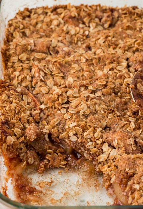 Pan of the apple crisp with some taken out of it Applecrisp Crumble With Oats, Crispy Apple Crisp, Apple Crisp Recipe With Oats, Old Fashioned Apple Crisp, Crockpot Apple Crisp, Homemade Apple Crisp, Kid Friendly Salad, Oatmeal Crisp, Best Apple Crisp