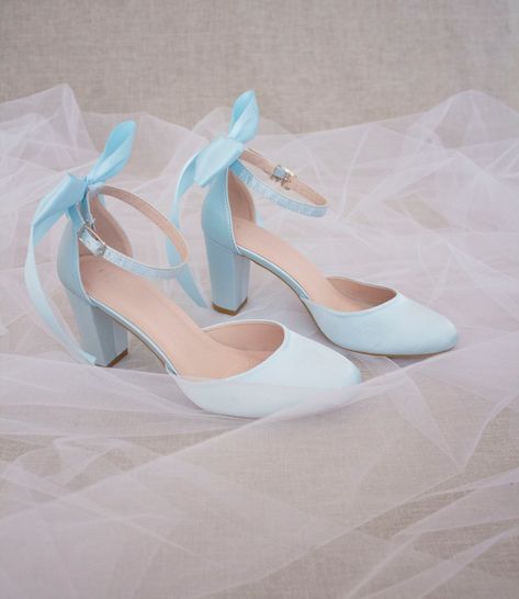 Satin block heel with added back bow to highlight your look for any occasion. Perfect wear for fall or summer wedding, bridesmaids, bridal party, holiday party, and any special occasions.  DETAILS: HEEL HEIGHT: 3 inches COLORS AVAILABLE: White, Ivory, Light Blue, Champagne, Burgundy, and Navy UPPER: Synthetic upper and lining MATERIALS: Mandmade outsole STYLE NAME: SARAH Not sure of which size to purchase? Shoes measurements are as follow: (Please note measurements taken the length of inside of Baby Blue Bridal Shoes, Light Blue Block Heels, Blue Heels For Wedding, Light Blue Prom Shoes, Baby Blue Wedding Shoes, Blue Prom Shoes, Light Blue Sweet 16, Quinceanera Heels, Light Blue Wedding Shoes