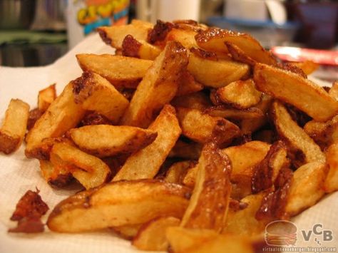 These delicious, slender fries have a crisp exterior and a creamy interior, contain 1/3 less oil than traditional methods, and could not be easier to make.   Recipe is from Cooks Illustrated (July, 2009) and the method is attributed to Michelin-starred French chef Jel Robuchon. It skips the usual rinsing and soaking and you only need to fry once.  You must use Yukon golds (Russets are too starchy). Easy French Fries, National French Fry Day, Cooks Illustrated Recipes, Making French Fries, Illustrated Recipe, Homemade French Fries, Healthy Vegan Snacks, Baked Fries, Cooks Illustrated