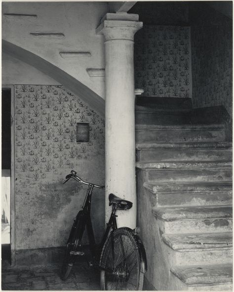 [The Bicycle, Luzzara, Italy]; Paul Strand (American, 1890 - 1976); 1953; Gelatin silver print; 24.4 x 19.4 cm (9 5/8 x 7 5/8 in.); 86.XM.683.37; Copyright: © Aperture Foundation Alevel Photography, Paul Strand, Straight Photography, Harry Callahan, Edward Steichen, Andre Kertesz, Edward Weston, Alfred Stieglitz, Stair Case