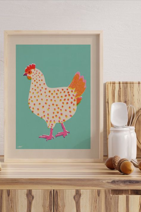 Created in a charming risograph style, the print features an illustration of a spotted chicken. The vintage-inspired aesthetic and earthy tones create a cozy and inviting look, perfect for farmhouse-inspired spaces. Retro Farmhouse, Chicken Print, Inspired Aesthetic, Unique Art Prints, Country Style Kitchen, Kitchen Prints, Art Prints For Home, Style Kitchen, Nursery Inspiration