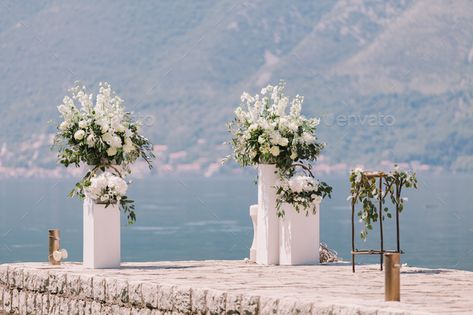 wedding arch decoration with beautiful view by avanti_photo. wedding arch decoration with beautiful view. Destination wedding. #Sponsored #decoration, #arch, #wedding, #beautiful Altar Flowers Wedding, Wedding Cermony, Acrylic Pedestal, Alter Flowers, Wedding Pillars, Wedding Alters, Display Pedestal, Altar Flowers, Arch Wedding