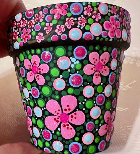 Terra cotta pot hand painted with dot art; coated with glaze. Crafts With Terra Cotta Pots, Stash Jar Ideas Diy Paint, Hand Painted Pots Diy, Diy Painted Flower Pots, Clay Pot Painting, Painting Flower Pots, Decorated Pots, Hand Painted Pots, Painting Pots