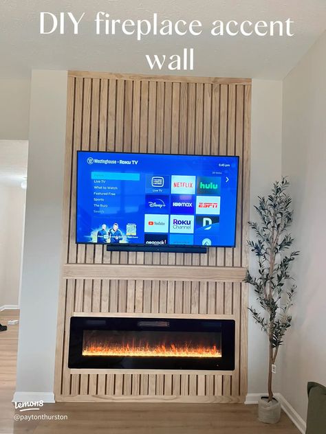 We turned this pocket wall into a flushed slatted fireplace wall! I wanted something neutral, earthy, and cohesive to the rest of Slat Wall Fireplace With Mantle, Slatted Fireplace, Slat Wall Fireplace, Accent Wall Gallery, Fireplace Accent Wall, 60 Inch Electric Fireplace, Fireplace Accent Walls, Weathered Oak Stain, Dining Room Accent Wall