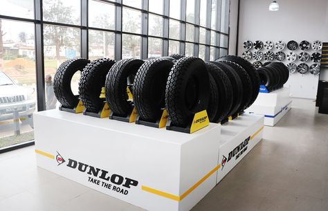 Tire Display Ideas, Tire Shop Decor Ideas, Car Repair Shop Design, Branding Signage, Shop Shelving, Minimal Bathroom, Tire Shop, Automotive Shops, Car Workshop