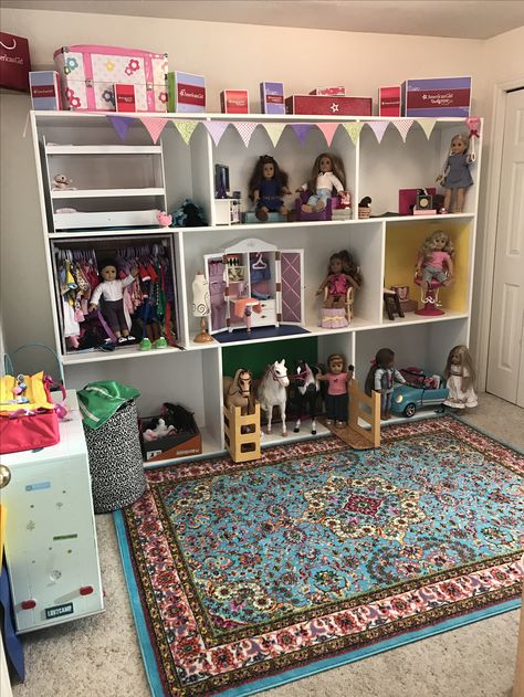 We built a book shelf that she can use as a life size doll house for now! So organized! Everything in its place! Functional for later too. Craft Storage In Living Room, My Life Doll House Diy, Doll House Organization Ideas, Ag Doll House Diy, My Life Doll Storage Ideas, American Doll Storage Ideas, Doll Organization Ideas, American Girl Storage, Life Size Doll