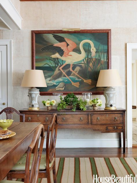 The flamingo, painted by British artist William Skilling, “is fun,” Newberry says.   It hangs over an 18th century Welsh dresser. Custom carpet by Beauvais.  All images courtesy of House Beautiful.  Article: Produced by David M. Murphy Styled by Gregory Bissonnette  Interior design by Connie Newberry Interview by Christine Pittel Photographs by Jonny Valiant British Colonial Decor, Welsh Dresser, Dresser Design, British Colonial Style, Colonial Decor, Custom Carpet, Foo Dog, Dog Blog, House Beautiful