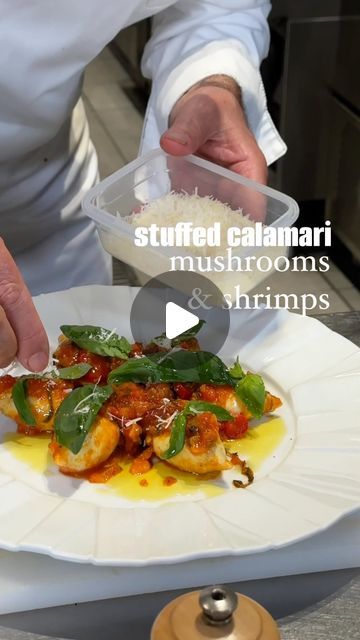 Joseph Hadad on Instagram: "WOW 🤯 you need to try this… Shrimps and Mushrooms Stuffed Calamari 🦑 

Filling:
- 7-8 medium calamari
- 4 large mushrooms
- 7 shrimp
- 1 tablespoon chopped parsley
- 1 white onion
- 4 tablespoons of olive oil
- 2 sprigs green thyme (leaves hurt)
- Salt and pepper to taste

Sauce:
- 7-8 tomatoes (medium to large, grated)
- 1 white onion
- 2 cloves of garlic
- 6-7 basil leaves
- 4 tablespoons white wine
- 1/2 hot pepper (or more if you want it more spicy)
- 4 tablespoons of olive oil
- 2 sprigs of green thyme
- Salt and pepper to taste
- a few pitted olives
+Basil and Parmesan for decoration

Process:
1. Filling: Saute the chopped onion in the hot oil until it is translucent. Add the finely chopped mushrooms, salt, pepper, thyme leaves and cook for 5 minutes. Ad Stuffed Calamari, Mushrooms Stuffed, Thyme Salt, Large Mushroom, Hot Pepper, Basil Leaves, White Onion, Hot Oil, Calamari