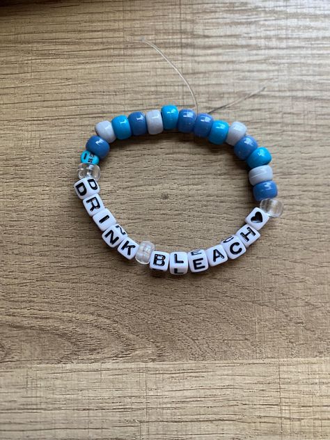 Hand made beaded Bracelet! One size fits all (let me know in the personalization tab if you would like it to be on the bigger or smaller side). I use a clear elastic band that can stretch. Nail polish is used to seal the string together. Let me know if you would like a color other than blue :) Funny Clay Bead Bracelet, Best Friend Kandi Bracelets, Word To Put On Bracelet, Sister Bracelet Ideas, Unhinged Bracelet Ideas, Clay Bead Bracelet Ideas Grunge, Bracelet Word Ideas Funny, G59 Bracelet, Bracket Ideas Beads