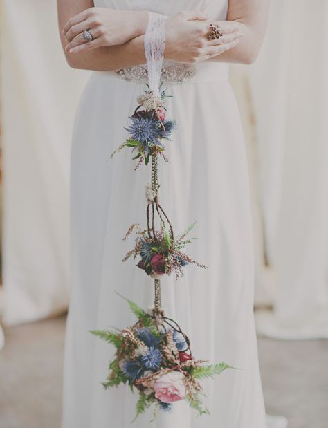 hanging floral balls.  What a perfect Bridal Bouquet.  So different and unique. Wedding Bouquet Hanging, Alternative To Wedding Bouquet, Dangling Wedding Bouquet, Anti Bride Bouquet, Hanging Wedding Bouquets, Hanging Bouquet Wedding, Non Traditional Wedding Flowers, Unusual Wedding Bouquets Creative Unique, Wedding Bouquets With Ribbon Hanging