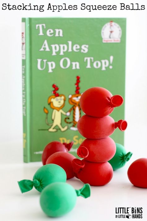 Apple Squeeze Balls Stacking Activity for Ten Apples up On Top Apple Activities For Kids, Apple Balls, Ten Apples Up On Top, Wooden Pyramid, Preschool Apple Theme, September Preschool, Apple Lessons, Apple Preschool, Dr. Seuss