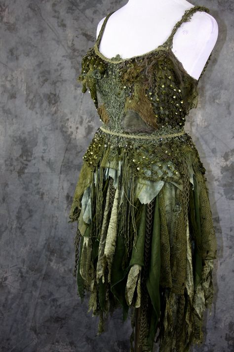 This dress was a special order: Bohemian Style Deep Woodland Forest Fairy, Dryad costume dress. The dress is made with all complimentary shades of moss greens, a tiny bit of gray and brown mixed in. It is constructed from a size small base dress, using a mixture of antique and vintage fabrics, antique appliques dyed to match color scheme, Silk webbing with tassels, and crystal bead fringe. Dryad Costume, Forest Fairy Costume, Faerie Costume, Forest Festival, Ren Faire Costume, Fairy Outfit, Fair Outfits, Bead Fringe, Gray And Brown