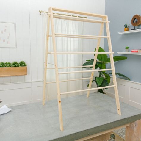 Make your own laundry drying rack with our step-by-step guide. #diy #doityourself #dundiy Diy Clothes Drying Rack Outdoor, Diy Dry Rack Laundry, Diy Clothes Dryer Rack, Diy Clothes Drying Rack Indoor, Diy Drying Rack Laundry, Diy Canvas Drying Rack, Wood Drying Rack, Diy Hanging Rack, Folding Hanging Rack