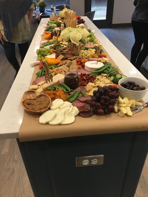 Butcher paper down the kitchen Island makes a fantastic cheeseboard Island Cheese Board, Charcuterie Spread Kitchen Island, Grazing Table Kitchen Island, Island Grazing Table, Food Set Up On Kitchen Island, Grazing Table On Kitchen Island, Wine And Cheese Table Setting, Butcher Paper Buffet Table, Charcuterie Board Kitchen Island