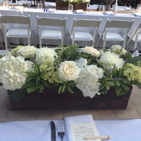 neutral palette of flowers in long wooden boxes Low Centerpieces, Hydrangeas, Roses Wedding Reception Flower Arrangements, Flower Box Centerpiece, Wooden Flower Boxes, Wooden Box Centerpiece, Wedding Flowers Hydrangea, Flowers Hydrangea, Beautiful Wedding Reception, Deco Champetre, Dining Room Table Centerpieces