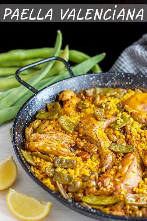 Traditional Paella Valenciana Recipe. Paella is a great Spanish rice dish to share with family and friends. It's easier than you think. #paella #valenciana #spanishcuisine Foods From Spain Traditional, Paella Recipe Authentic, Spanish Rice Dish, Valenciana Recipe, Valencia Paella, Traditional Paella, Easy Paella, Traditional Spanish Recipes, Spanish Paella