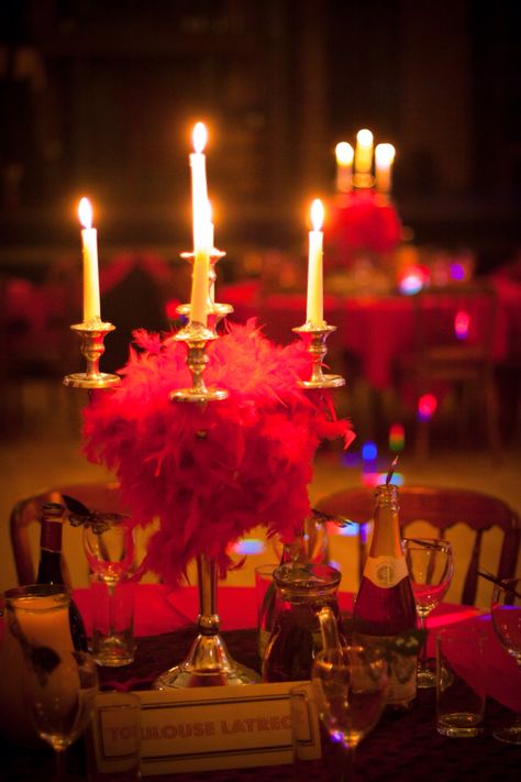 Moulin Rouge wedding cabaret decor, set up in old Georgian theatre. Red feather boas wrapped around candelabras. Moulin Rouge Party Ideas, Moulin Rouge Themed Party, Moulin Rouge Hen Party, Moulin Rouge Party Food, Cabaret Party Ideas, Cabaret Party Theme, Cabaret Centerpieces, Burlesque Decorations, Moulin Rouge Decorations