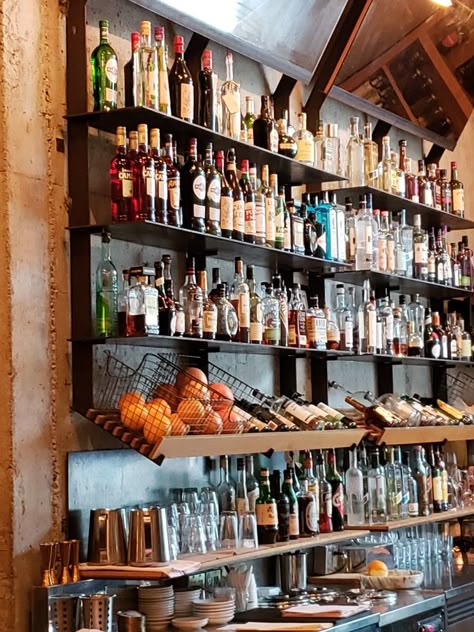 Bar Shelf Ideas Restaurant, Industrial Bar Shelving, Amazing Bar Design, Back Bar Shelving Design, Wine And Tapas Bar, Backbar Shelving, Back Bar Ideas, Brass Bar Shelves, Wine Boutique Shops