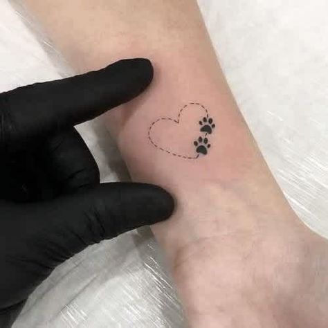 tiny pawprint tattoo Tiny Paw Print, Puppy Tattoo, 42 Tattoo, Pawprint Tattoo, Dog Paw Tattoo, Petit Tattoo, Paw Tattoo, Inspiration Tattoos, Little Tattoos