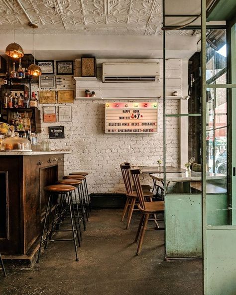 Rustic industrial cafe interiors with wooden accessories and metalwork New York Cafe Interior, Small Cafe Ideas, Small Food Shop, Coffee Shop Ceiling, Little Coffee Shop, Corporate Ladder, Industrial Cafe, Small Coffee Shop, Coffee Shop Interior Design