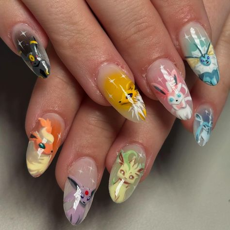 🔥💫🌀💧🖤⚡️🍃 #pokemon #eevee #eeveelution #pokemonnails #nailart #handpainted #characternails #nailartist #gelnails #gelx #apres #auranails #phoenixnails #aznails #nintendo Eevee Nails, Pokemon Nails Designs, Nintendo Nails, Zelda Nails, Pokemon Nail Art, Pokemon Nails, Christmas Pokemon, Pokemon Eevee, Simple Nail Designs