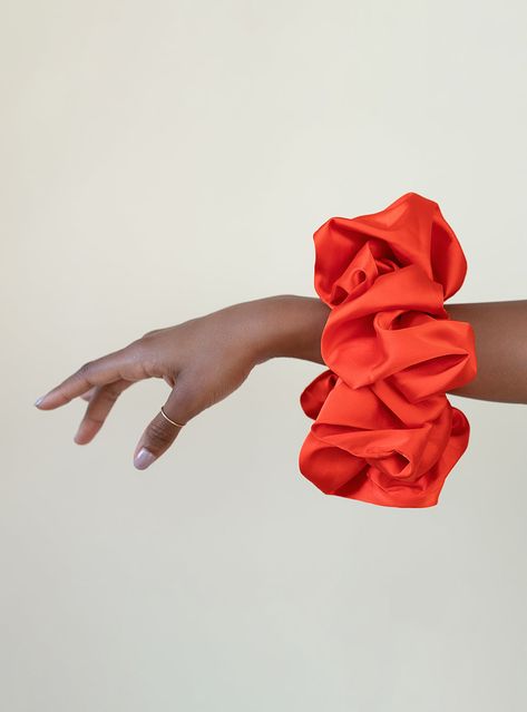 TO PUT IT BRIEFLY Voluminous and lightweight, ALLURE Satin Scrunchies are generous in size and offer colorful satin with a comfortable fit. WHY YOU'LL LOVE IT Satin for easy, protective styling Gemstone hues Generous size to fit your abundant locs, braids, coils, or twists Voluminous yet lightweight COLOR STORY Cherry is a juicy red inspired by its familial carmine roots. This scrunchie would shine when paired with bright and lively colors––perfect for making a delicate statement. Scrunchies Aesthetic, Satin Scrunchies, Hair Supplies, Wardrobe Wishlist, Hair Brands, Color Story, Hair Scrunchies, Color Stories, Scrunchie Hairstyles