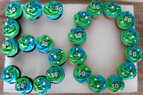 50th birthday cupcakes blue and green buttercream swirl silver. numbers fifty Number 50 Pull Apart Cupcake Cake, Number 50 Cupcake Cake, 50 Cupcake Cake Number For Men, Men’s Birthday Cupcake Ideas, 50 Birthday Cupcakes For Men, 50 Cupcakes Number, 50th Birthday Cupcake Cake, 50th Cupcake Ideas For Men, 70th Birthday Cupcakes For Men